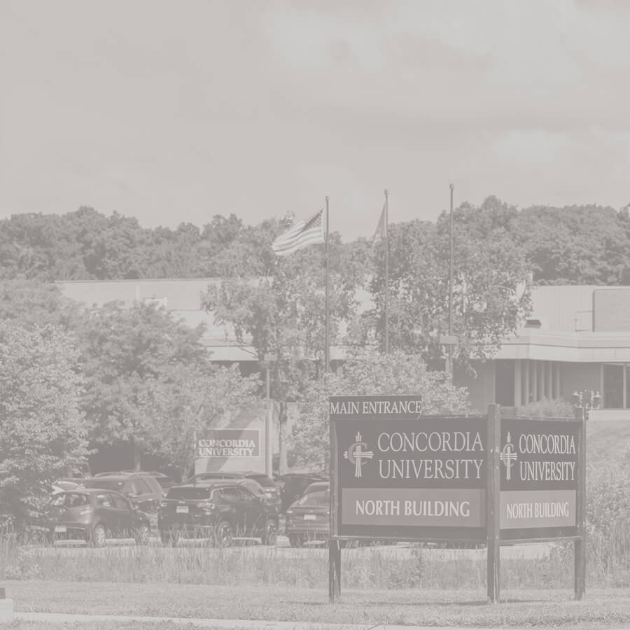 A wide shot of the Ann Arbor campus and the main entrance signage.
