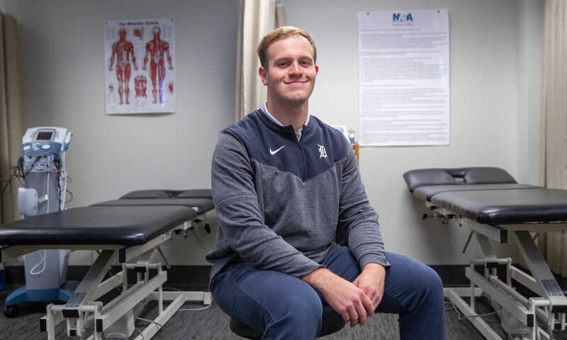 Master of Athletic Training student sits in classroom.